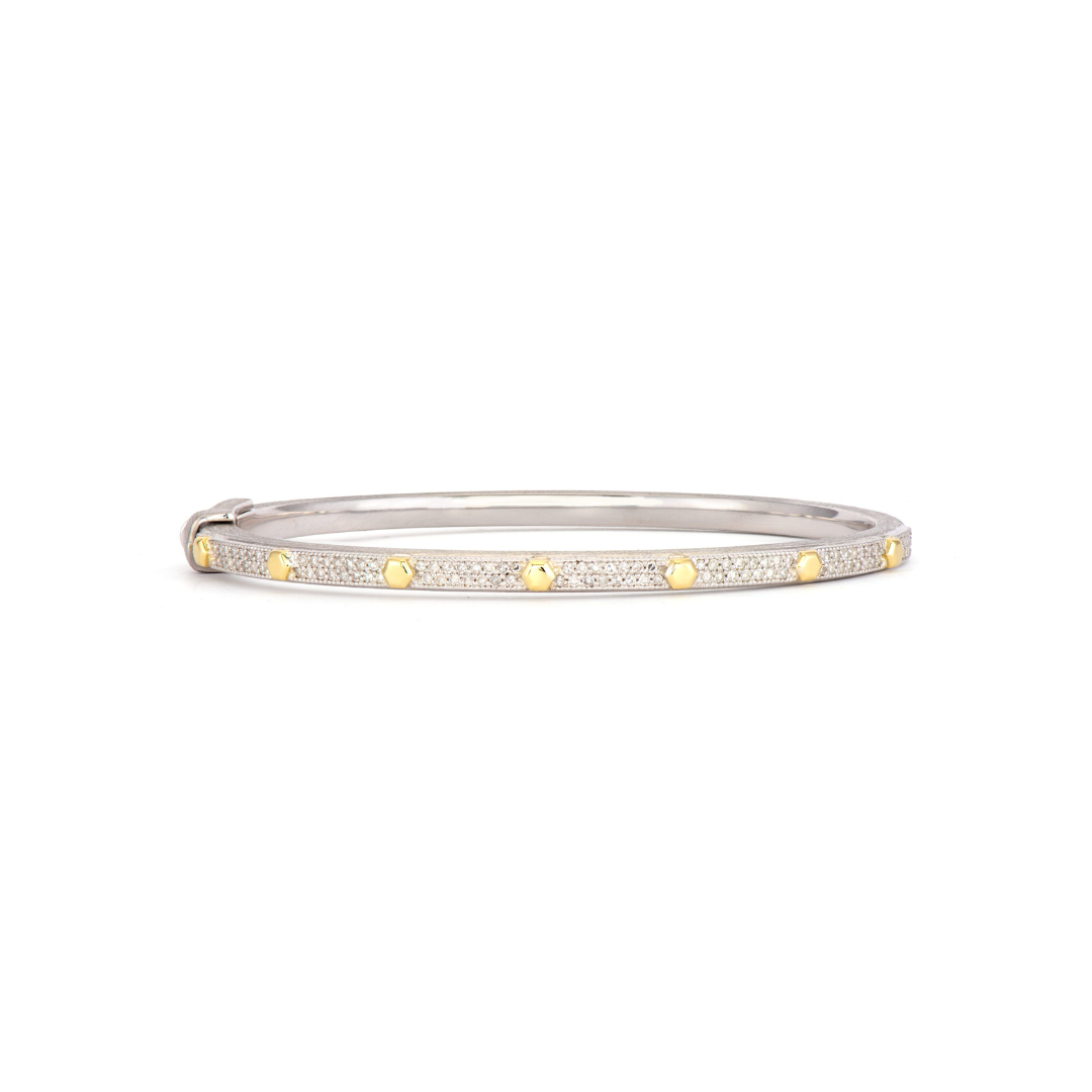 silver bangle with diamonds and gold hexagon shapes around