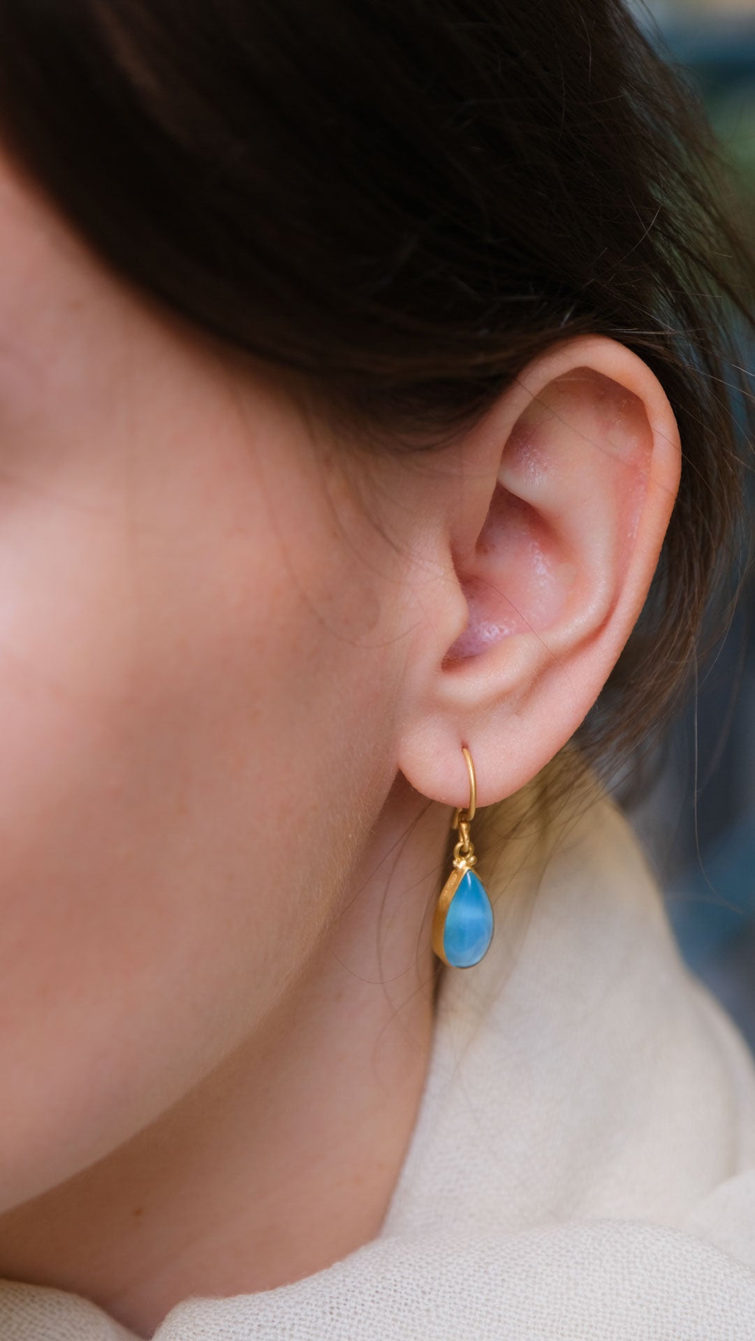 model wearing the earring
