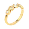 side view of gold ring with diamonds