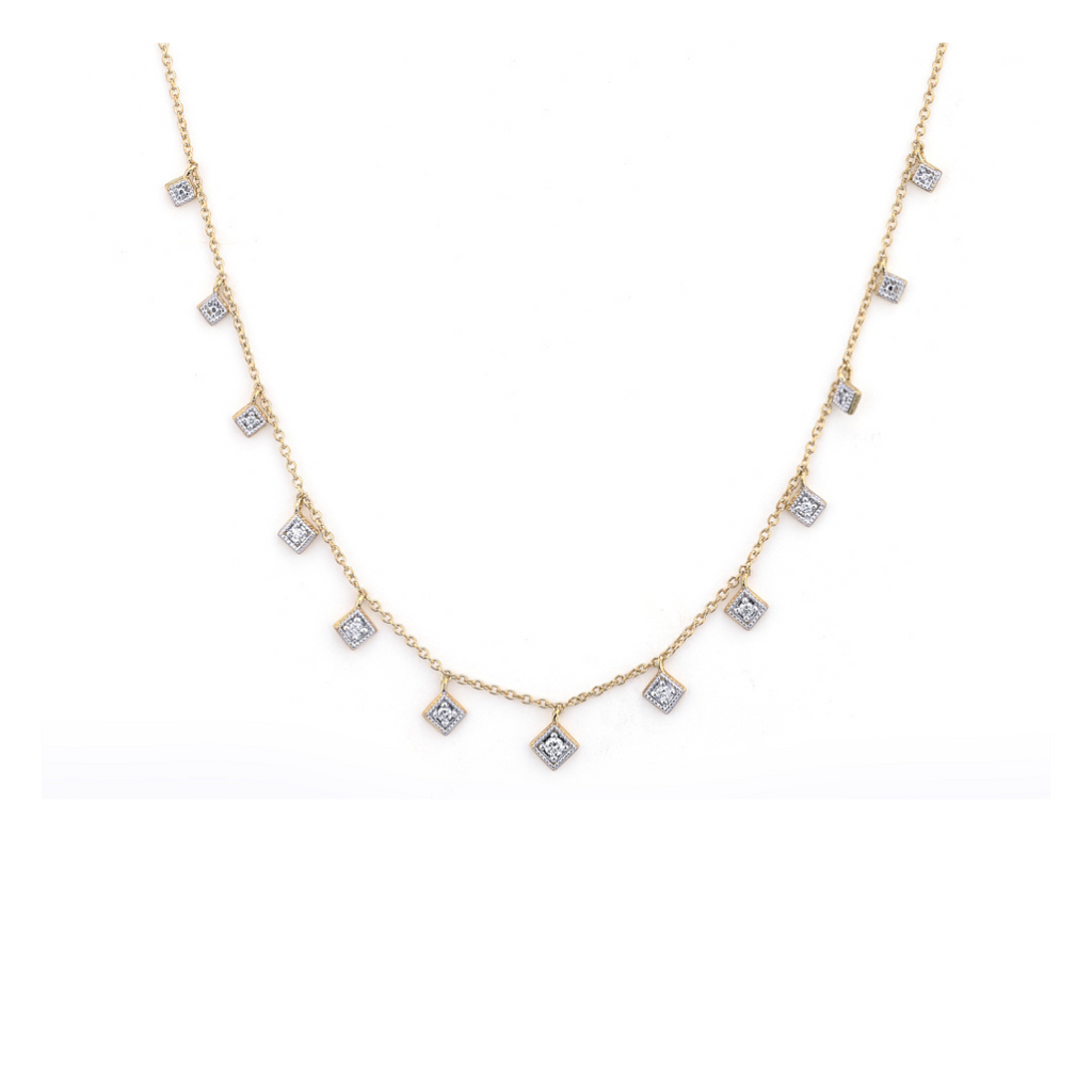 gold necklace with kite shaped diamonds