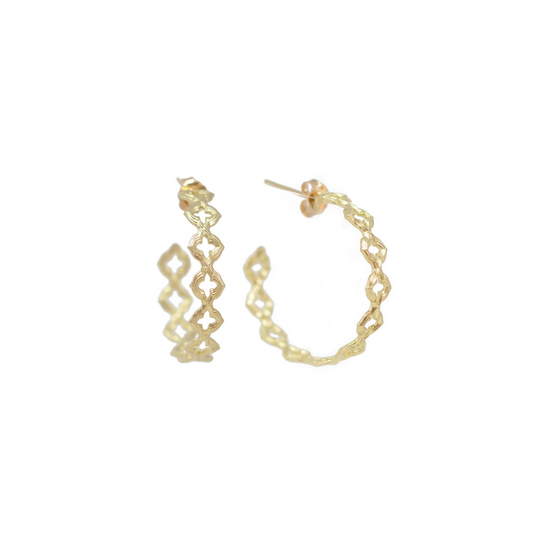 gold hoop earrings with design details