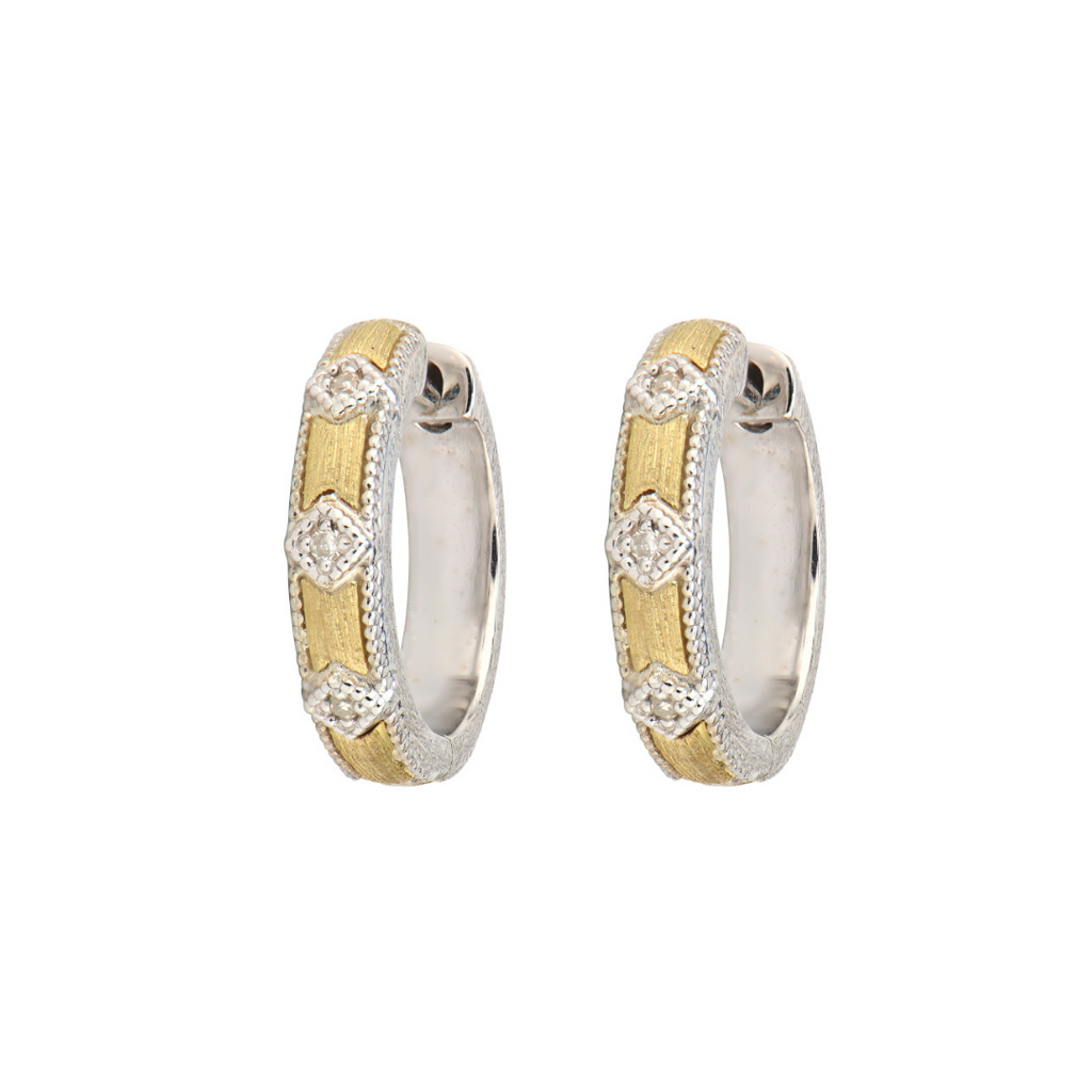 silver earrings with gold on the outside with diamonds