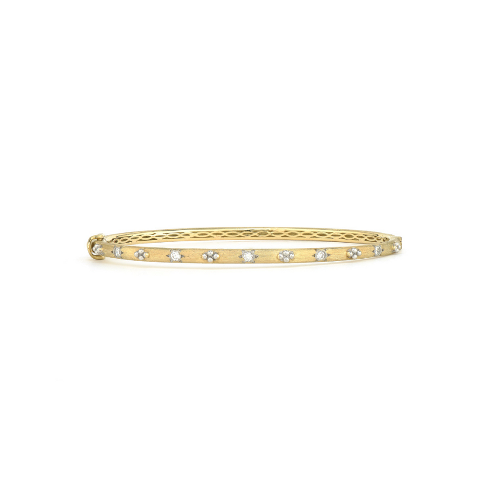 gold bangle with diamonds around 