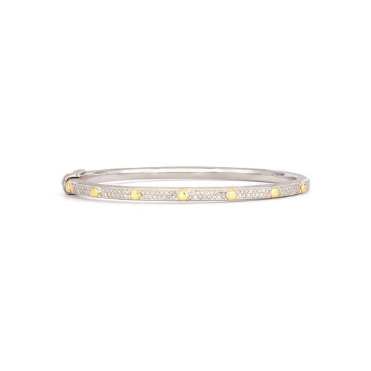 silver bangle with diamonds and gold hexagon shapes around 