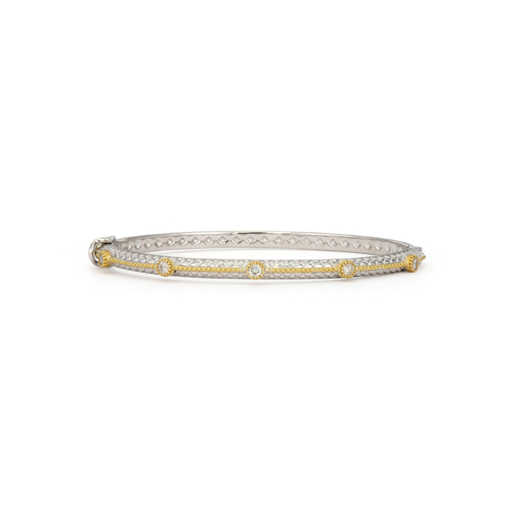 silver bangle with a gold rope and diamonds around