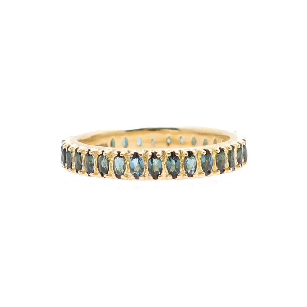 gold ring with blue green colored gemstones