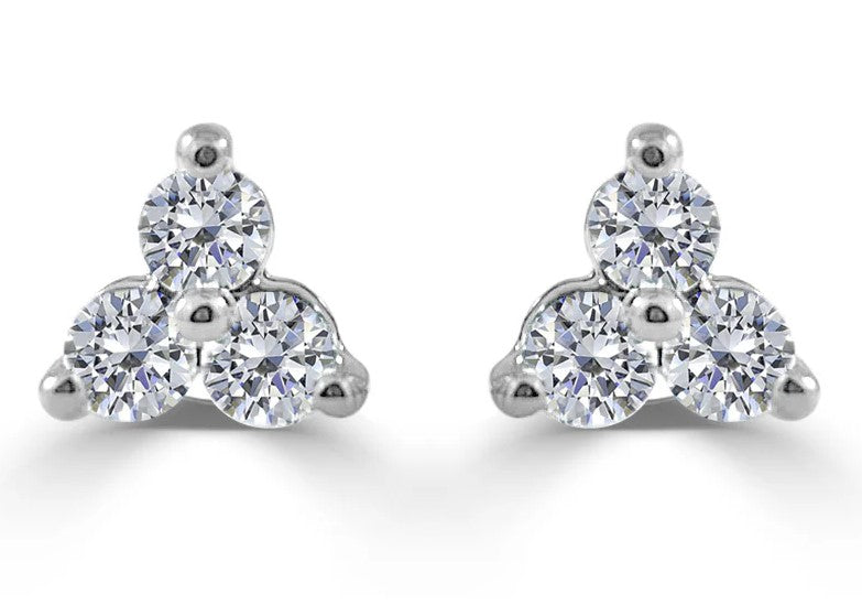 Pair of diamond stud earrings on a white background