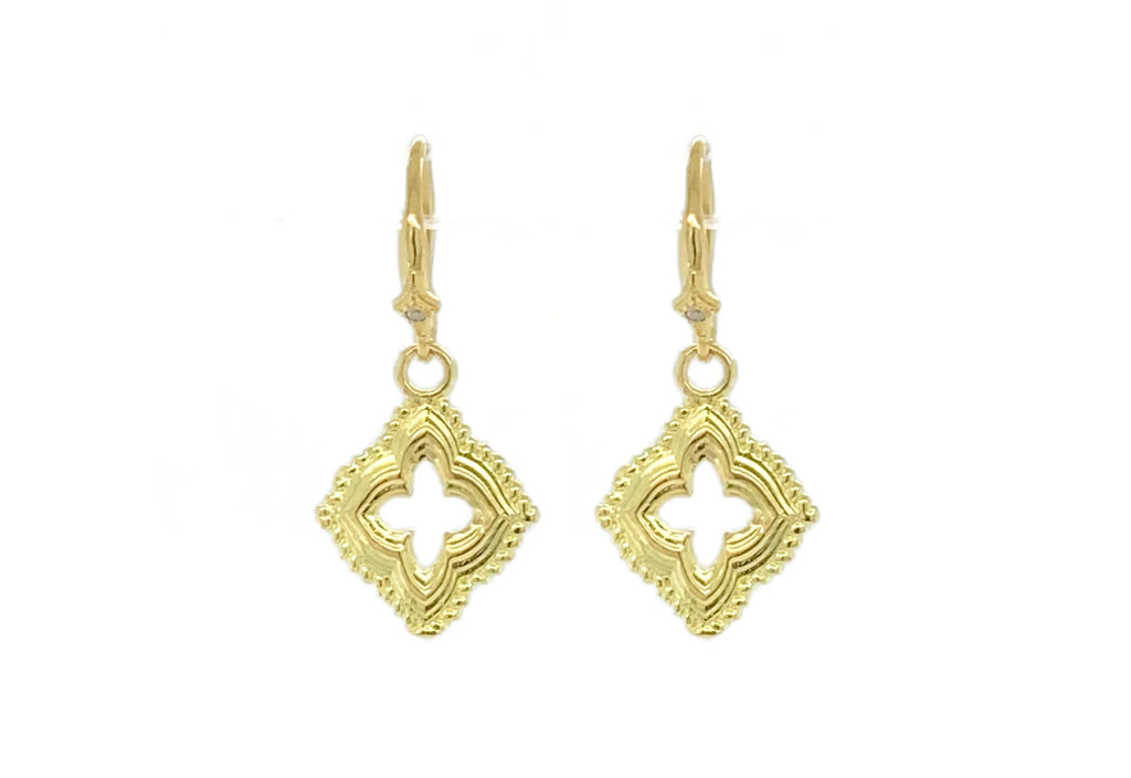 gold drop earrings with the center carved out