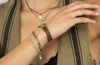 multiple bracelets on a model hand