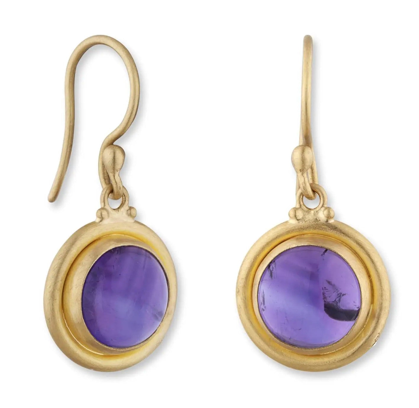 Gold earrings with purple gemstones on a white background