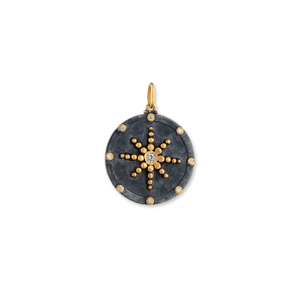 compass pendant with gold accents