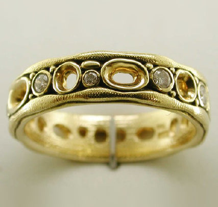 gold band with diamonds