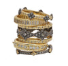 gold, diamond, and gemstone rings in stack