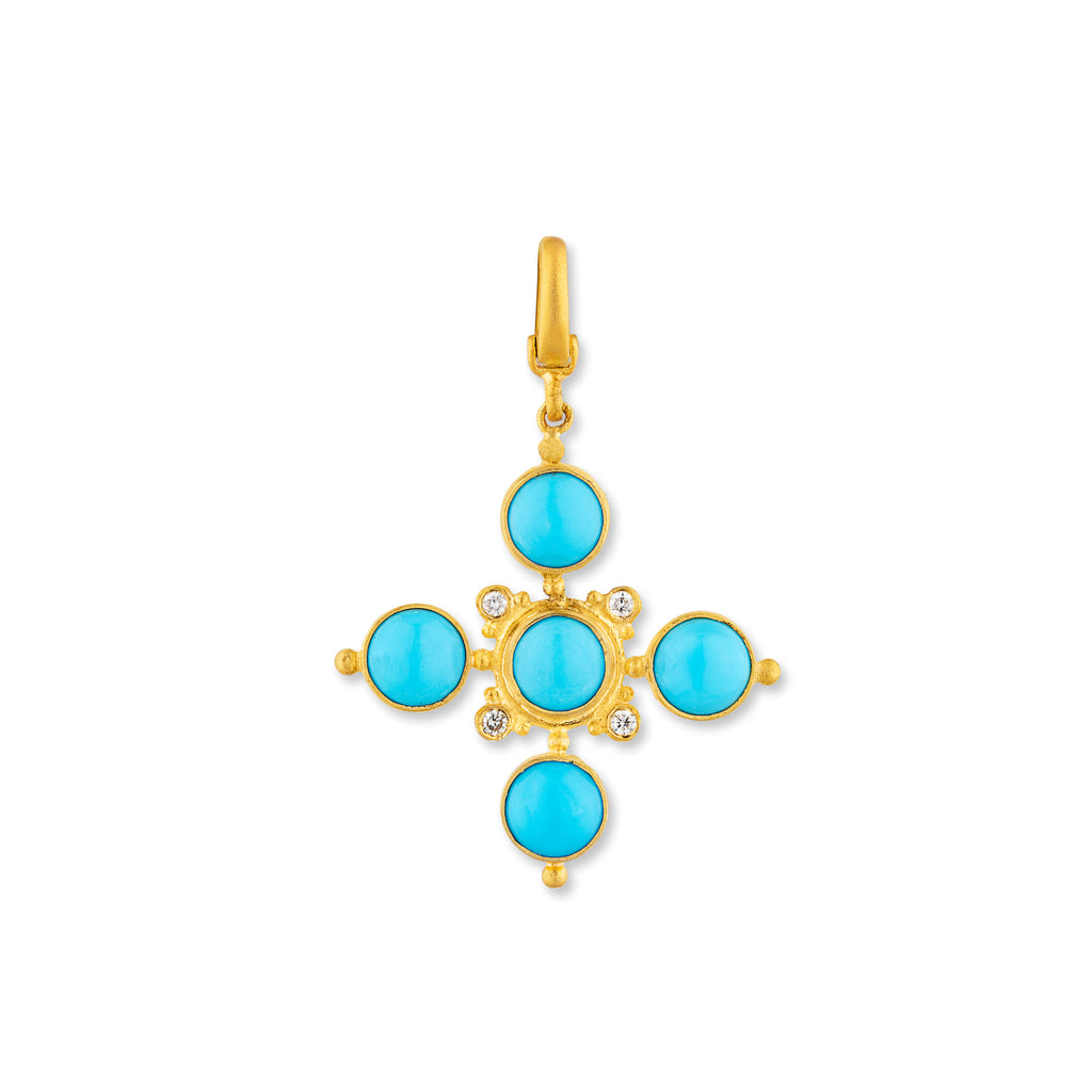 blue pendant with gold accents and diamonds