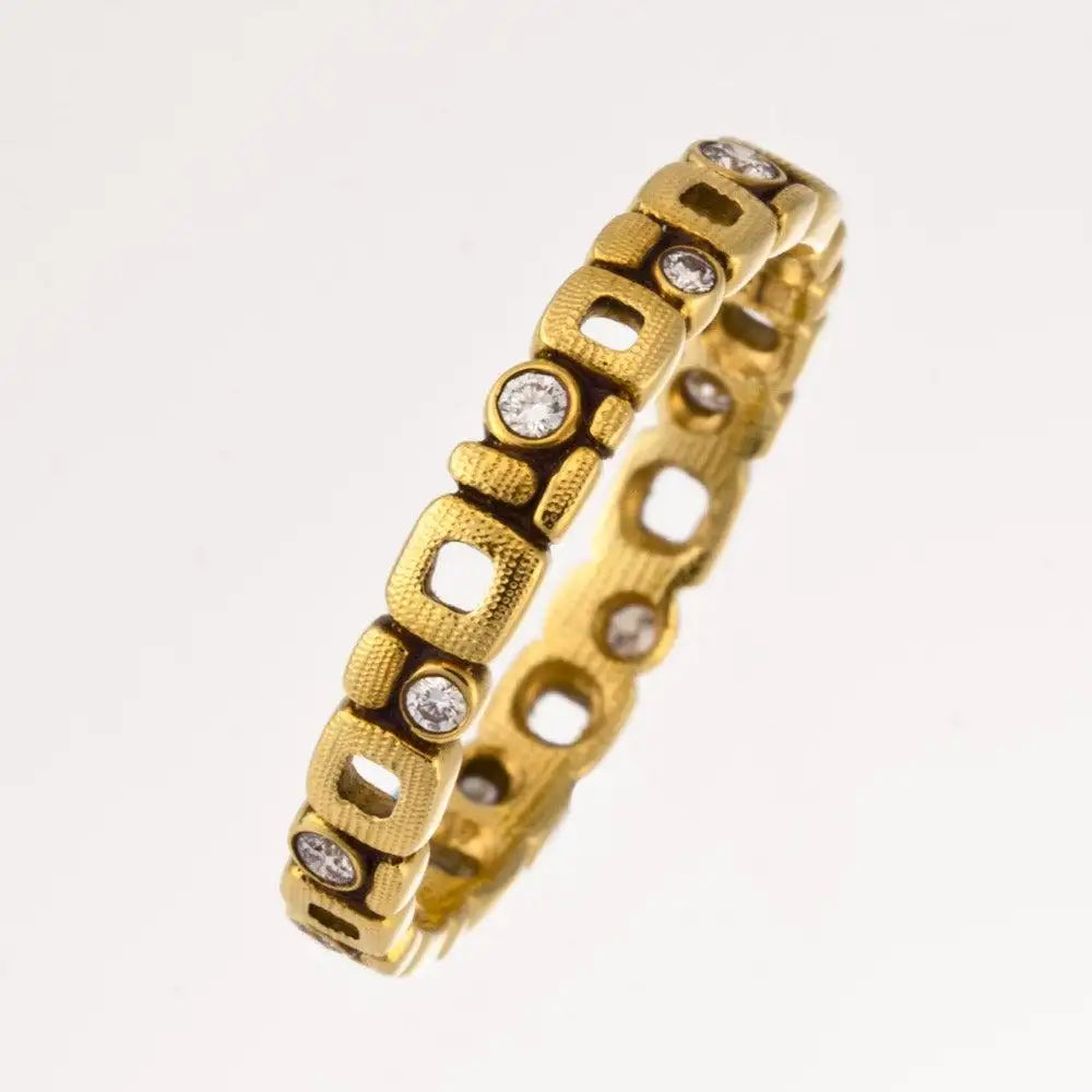 side view of gold ring with diamonds