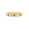 gold band with gemstones