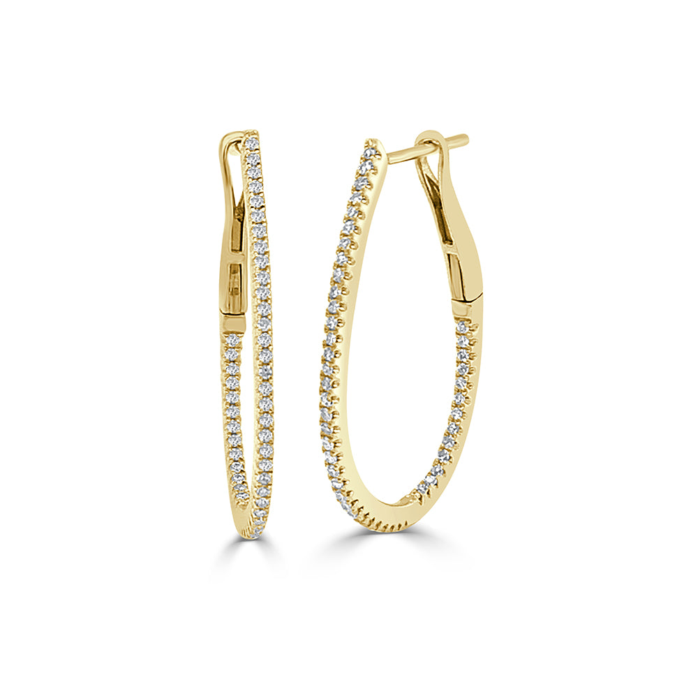 Gold hoops with diamonds in an oval shape