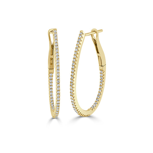 Gold hoops with diamonds in an oval shape