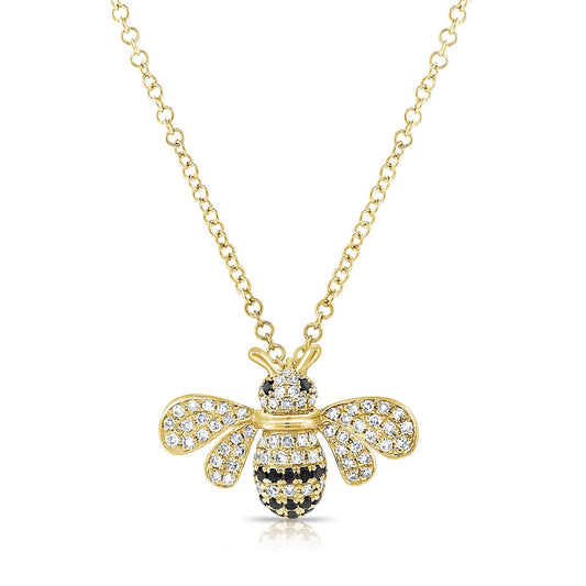 gold necklace with a gold and diamond bee with gemstones