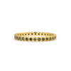 black stones on a gold ring band