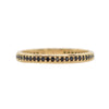 gold ring band with black gemstones