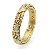 gold band with black on the outside with diamonds