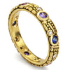 gold ring with diamonds and gemstones